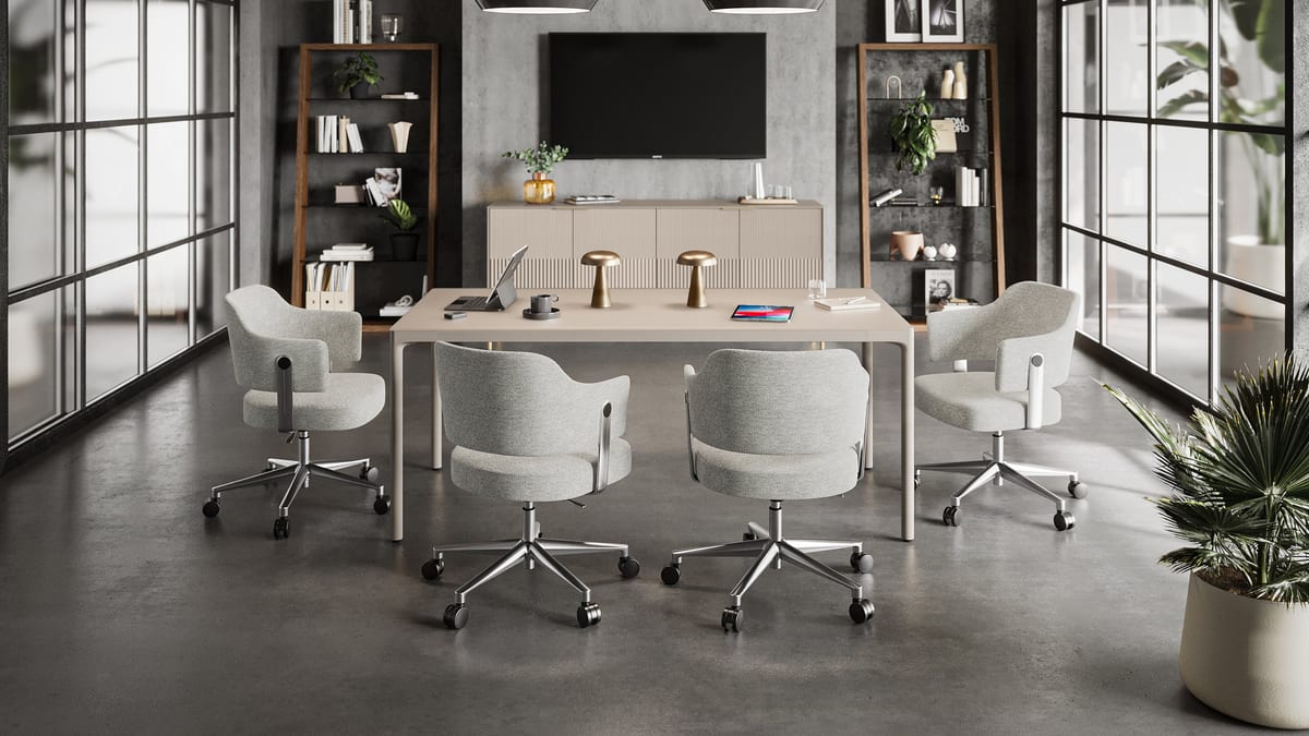 BDI Circa office task chairs are shown in a modern workspace with the BDI Zig credenza and Eileen leaning shelves.