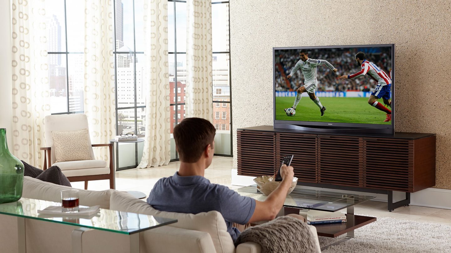 Signals from remote controls pass through the same doors of the Corridor 8179 TV stand that also keep components neatly concealed and out of view.