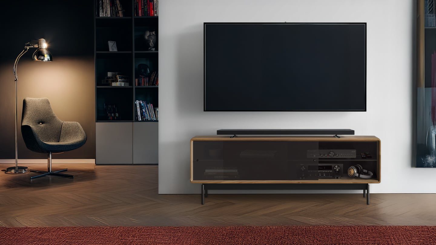 LINQ 65 Low Console modern tv cabinet with wood cabinet and glass doors and a dolby atmos speaker