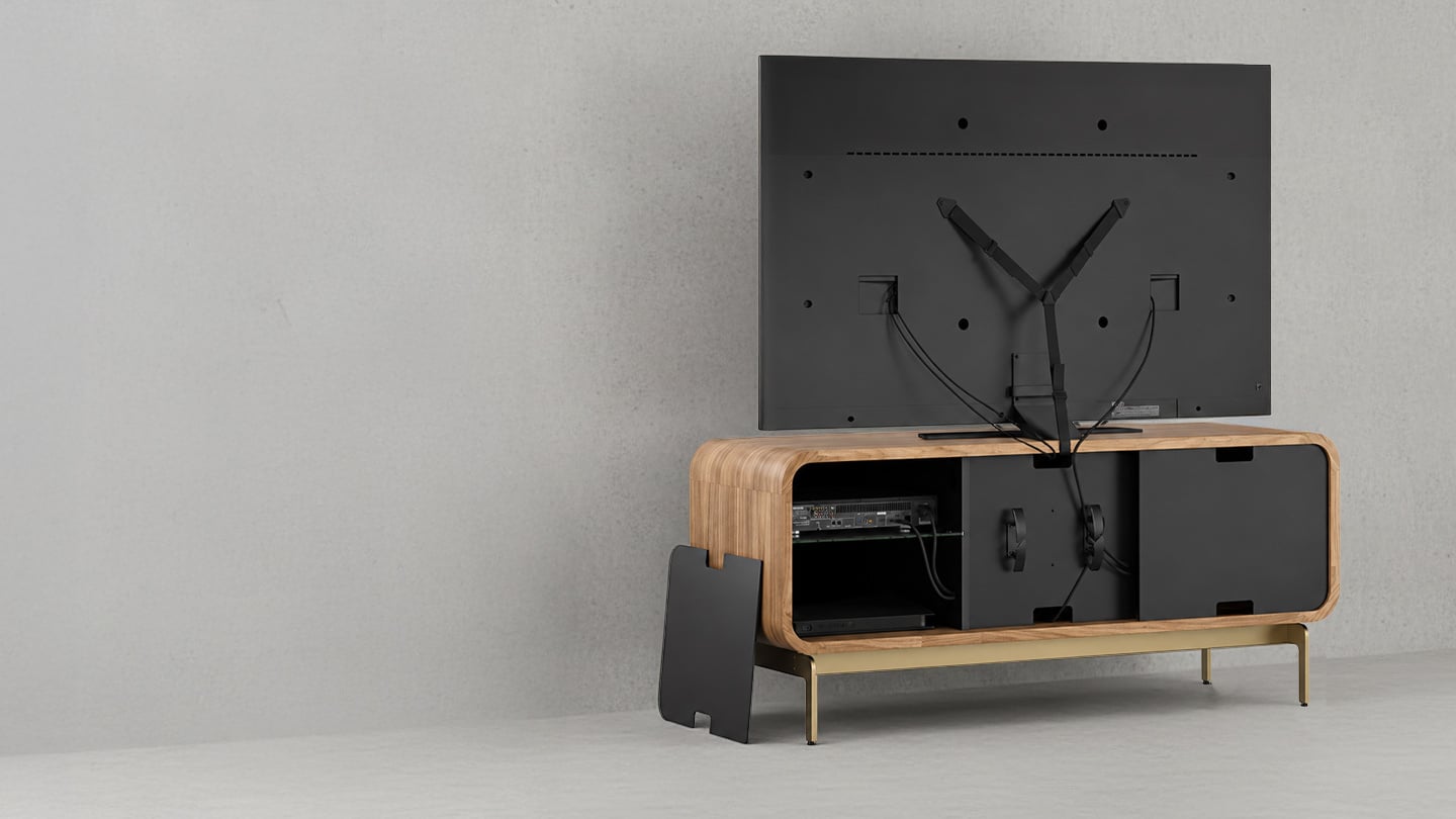 BDI Plume media cabinet in Natural Walnut with removable rear panels, integrated wire management, and TV safety strap.
