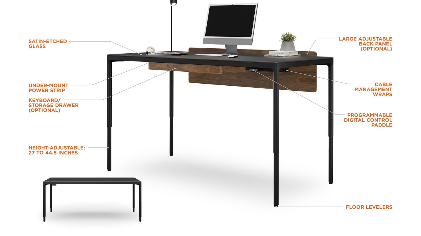 BDI Luma large standing desk with feature callouts for the satin-etched glass surface, ergonomic edges, and cable management.
