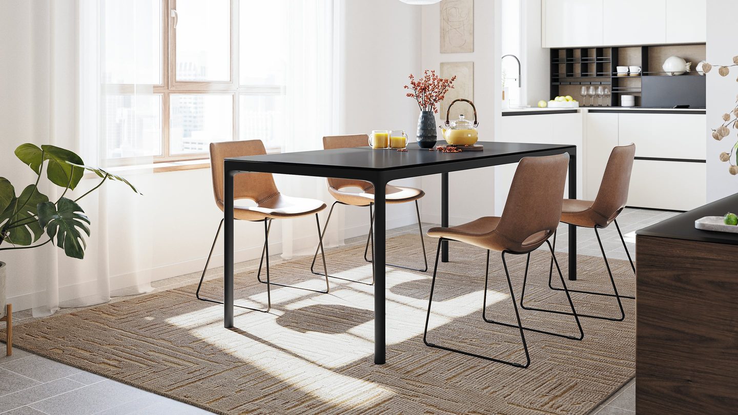 BDI Luma 6763S stationary desk shown as an elegant dining table in a modern interior.