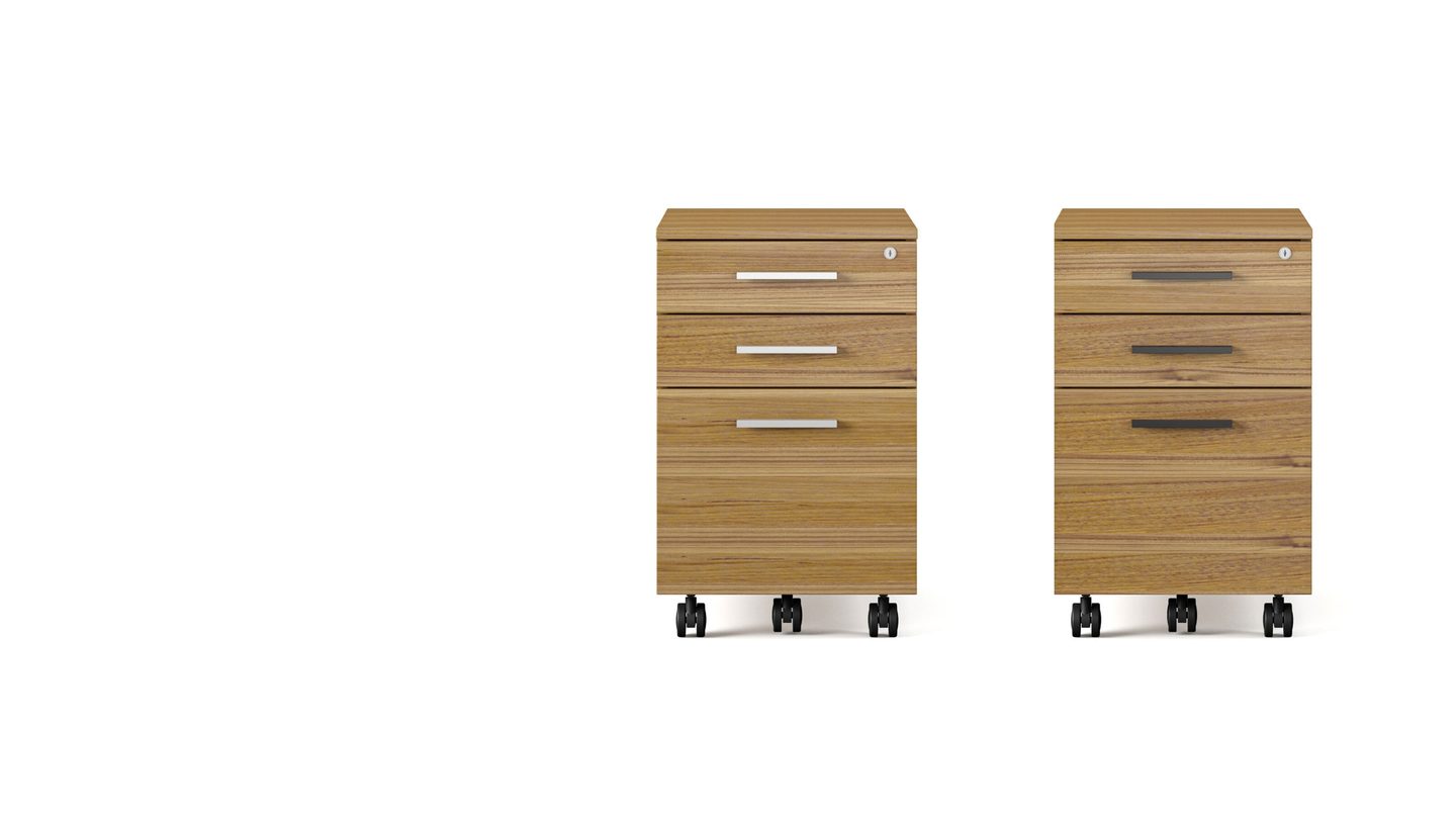 The Sequel 6107 mobile file pedestal includes black and satin nickel handles, which can be easily installed based on your style preference.