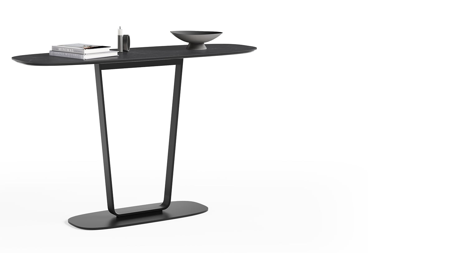 A solid steel bar curves to support the BDI Cloud 9 console table, creating a striking profile, while the weighted base keeps the table firmly and securely planted on the ground.