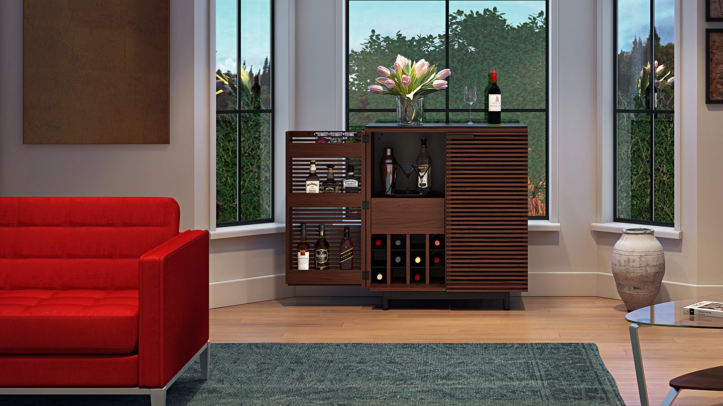 Corridor home bar by BDI, shown in chocolate stained walnut with one door open to reveal bar storage contained within.