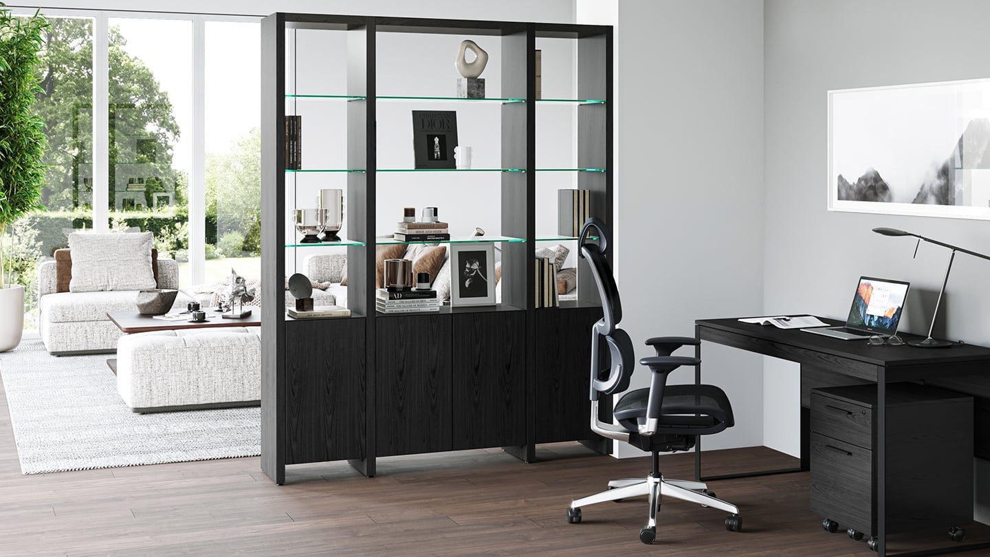 Linea shelves by BDI in charcoal finish, shown dividing a room.