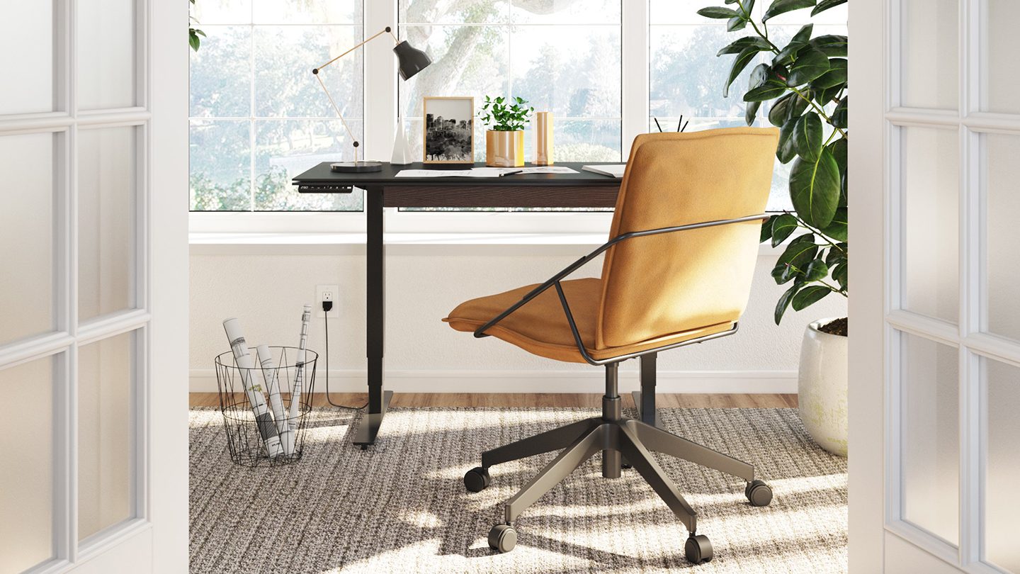 Stance 6650 small standing desk by BDI in a home office.