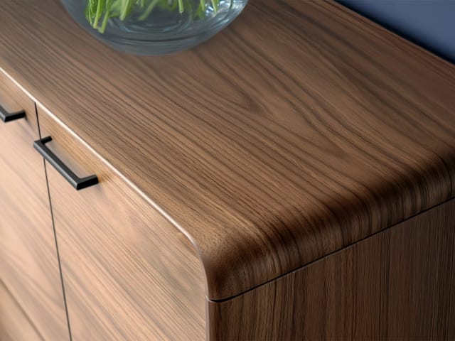 BDI LINQ 7585 walnut entryway cabinet detail with rounded hardwood edges and black drawer pulls.