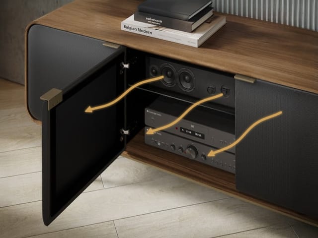 BDI Plume 8079 media cabinet in Natural Walnut showing acoustic transparency with sound and remote signals passing through fabric-wrapped doors.