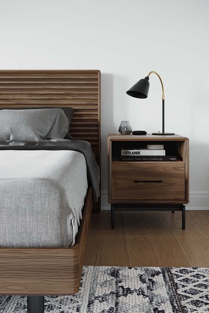 BDI LINQ 9181 modern bedside nightstand in walnut, sitting beside an Cross-LINQ modern bed.
