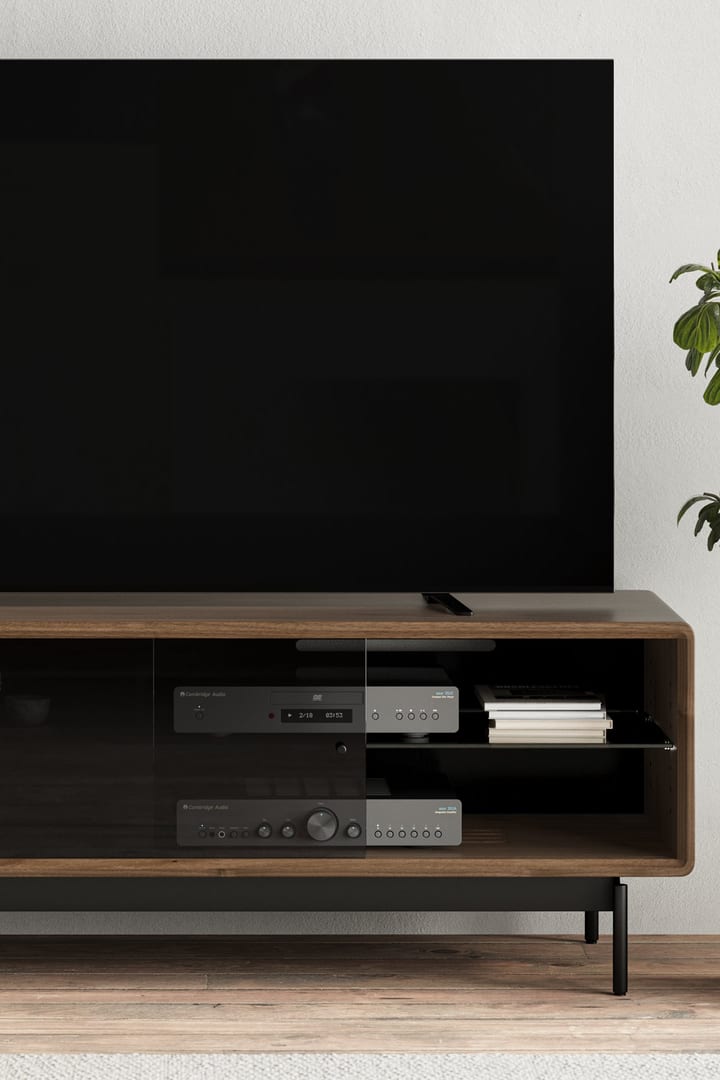 LINQ 65 Low Console showing tv components behind the sliding glass doors of a modern tv cabinet made of wood and glass