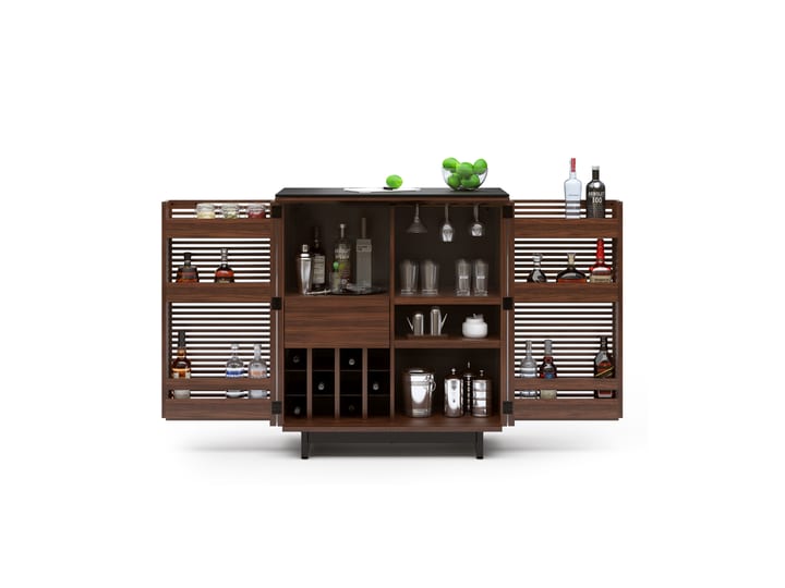 The Corridor 5620 modern bar in chocolate walnut from BDI featuring elegant louvered doors, bottle storage, glassware storage, stemware rack, adjustable shelf and satin-etched glass