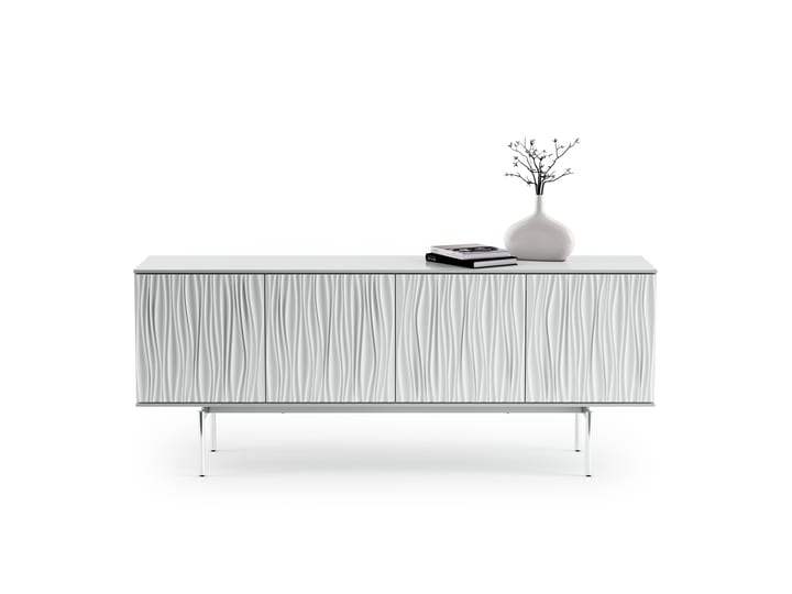 The Tanami 7109 media credenza from BDI in satin white finish featuring adjustable shelves, unique sculpted doors, flow-through ventilation, TV safety strap and adjustable levelers