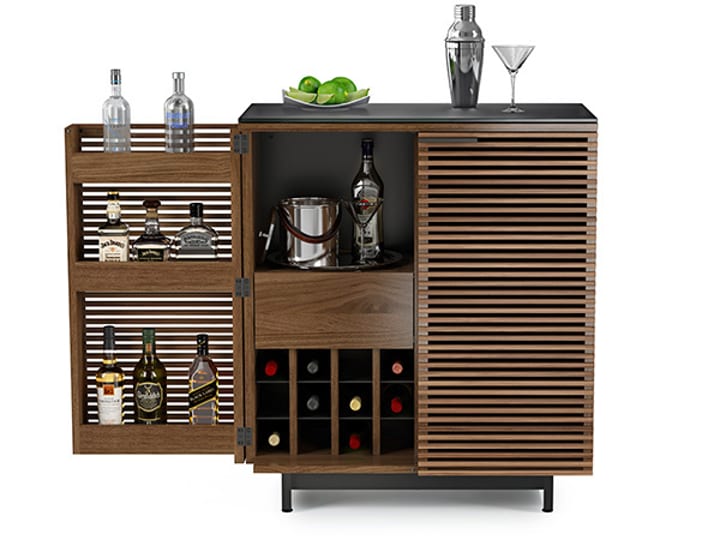 Home bar storage in natural walnut cabinet