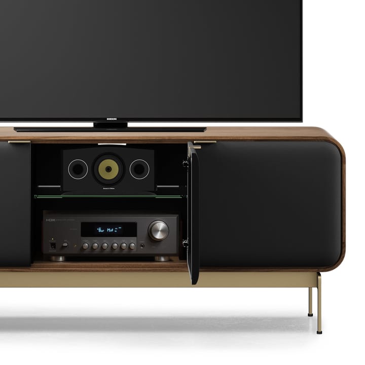 BDI Plume three-door media cabinet in Natural Walnut with open acoustic door revealing speakers and media components.