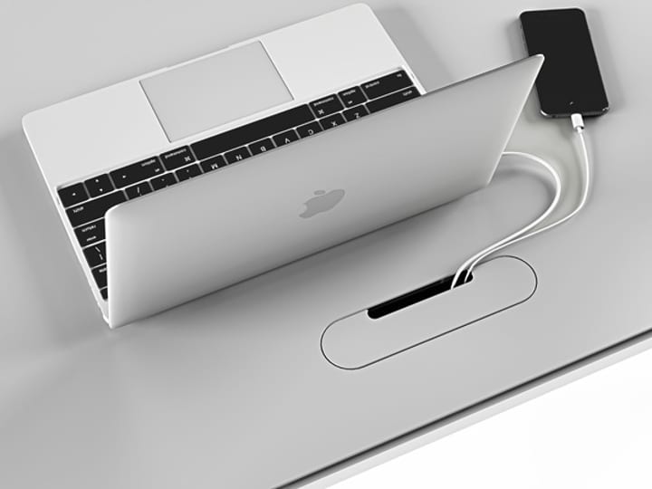 Wire management feature on the Centro Lift Standing Desk by BDI Furniture.