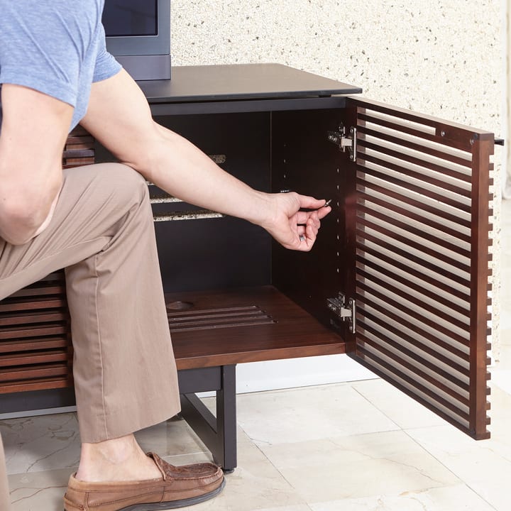 Threaded inserts help to reduce vibrations from sound in all BDI media cabinets and TV stands.