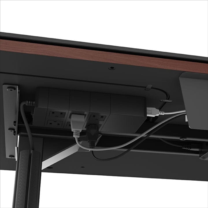 Mounting a power supply unit under the BDI Sequel Lift Standing Desk for improved cable management.