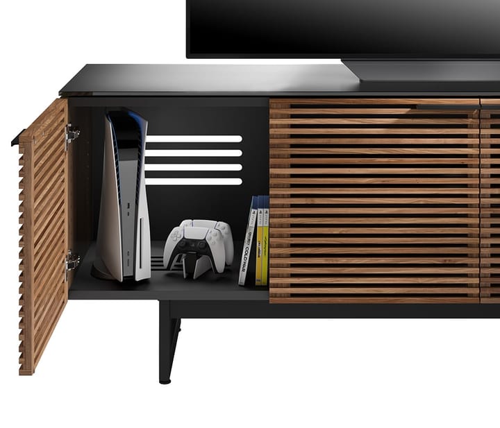 PlayStation 5 in the vertical position inside of the BDI Corridor 8179 TV stand.
