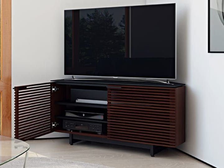 The Corridor media cabinet and corner TV stand by BDI Furniture features acoustically transparent doors that allows for sound pass-through behind closed doors.