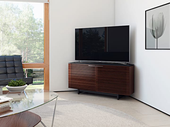BDI Corridor 8175 corner TV stand in Chocolate Stained Walnut, featuring remote and sound friendly louvered doors.