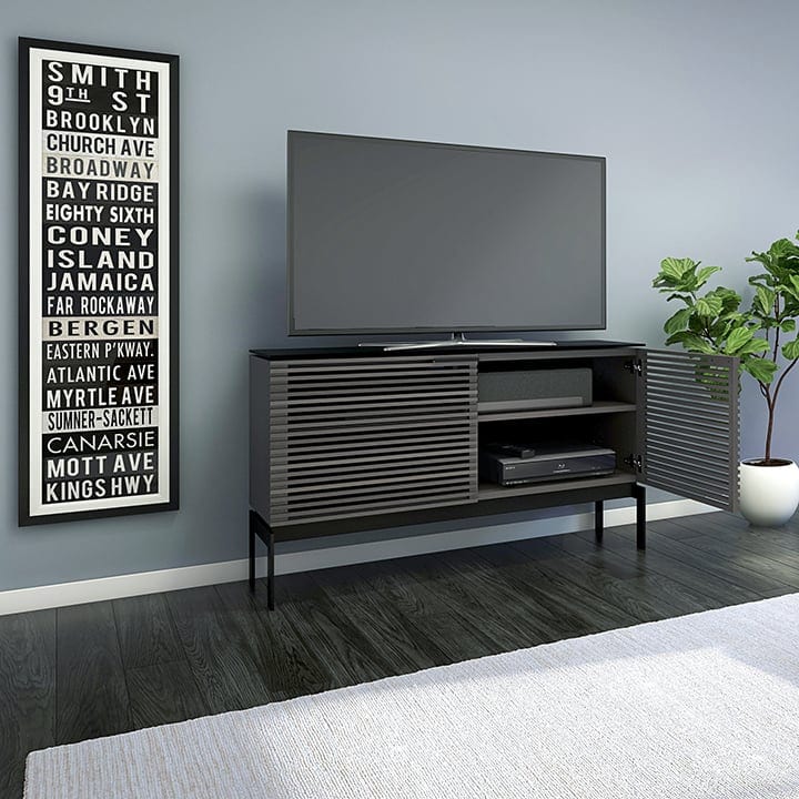 Louvered doors on the BDI Corridor SV TV cabinet allows for natural airflow to keep electronics cool.