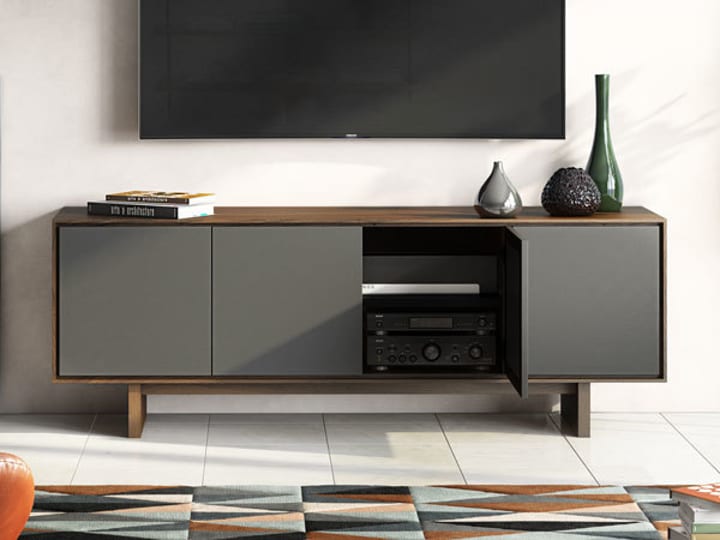 The Octave media cabinet and TV stand by BDI Furniture features acoustically transparent doors that allows for sound pass-through behind closed doors.