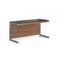 The Sequel Desk by BDI in walnut with a luxurious work surface and built-in keyboard drawer