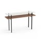 The elegant Terrace Console Table by BDI in walnut with tempered glass top and lower shelf